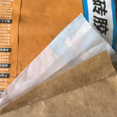 Προσαρμοσμένη επιφανειακή εκτύπωση 2 πλεονεκτήματα 80GSM Χάρτης Τσιμεντοποιητικές σακούλες 1 πλεονεκτήματα Πολυφυλλιάς Πολυπετραϊκό Χάρτη Αμυδρό για 20KG πλακάκια Κόλλημα μακροχρόνια